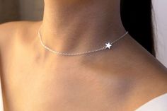 adjustable choker:shortest: 40.8 cmlongest: 46.0 cmAvailable in gold Adjustable Dainty Star Jewelry, Adjustable Minimalist Star Jewelry, Minimalist Adjustable Star Charm Jewelry, Simple Silver Choker Jewelry, Dainty Silver Choker As A Gift, Dainty Silver Choker For Gift, Dainty Star Charm Choker Necklace, Dainty Choker Necklace With Star Charm, Adjustable Silver Choker With Star Charm