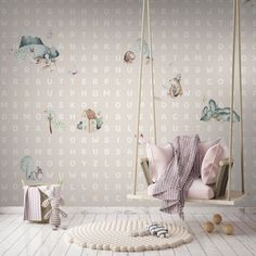 a child's room with pink and green wallpaper, swing chairs, rugs and toys