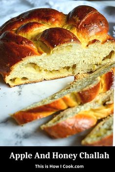 an apple and honey challah is cut in half