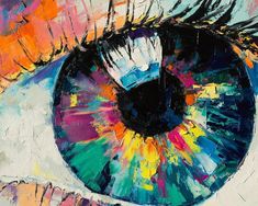 an eye with colorful paint on it