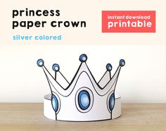 a paper crown sitting on top of a wooden table