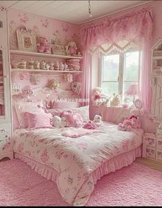 a bedroom decorated in pink and white with teddy bears on the bed