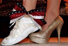 a pair of high heeled shoes with bows and sequins on the toes