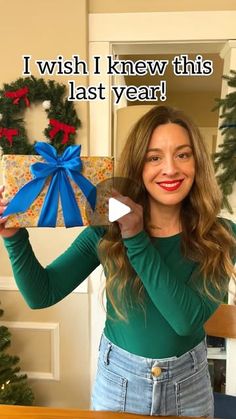 a woman holding up a present with the words i wish i knew this last year