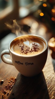 Indulge in the comforting embrace of a steaming cup of coffee that beckons you to take a moment for yourself. ✨ This beautifully captured image showcases a simple white mug with the cheerful phrase "coffee time," topped with a delicate heart-shaped froth and a sprinkle of cocoa. The warm light dances across the wooden table, creating a cozy ambiance that invites relaxation and enjoyment. Perfect for those who cherish their coffee rituals! ☕️🌼 #CoffeeLover #CozyVibes Drinking Coffee Aesthetic, Cup Of Coffee Aesthetic, Good Morning Tea, Love Cafe, Perfect Cup Of Coffee, Steaming Cup, Coffee Aesthetic, Cozy Ambiance