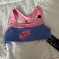 Nike Girls Sports Bra Size Xs Brand New With Tags Playful Nike Tops For Sports, Blue Sporty Activewear With Letter Print, Multicolor Sports Bra For Spring, Pink Sportswear Tops For Sports, Blue Letter Print Activewear For Sports, Blue Activewear With Letter Print For Sports, Pink Sports Bra For Spring, Nike Pink Sports Bra For Sports Season, Nike Pink Training Tops