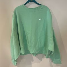 New Without Tag, Never Worn. Nike Trend Fleece Oversized Cropped Crew Neck Sweatshirt In Lime Green. Size Large Oversized Green Sweatshirt With Ribbed Cuffs, Green Fleece Top For Loungewear, Green Fleece Tops For Loungewear, Green Fleece Loungewear Top, Comfortable Green Sweatshirt For Loungewear, Nike Spring Sweats With Crew Neck, Nike Green Athleisure Sweatshirt, Sporty Green Fleece Sweater, Oversized Green Athleisure Sweats