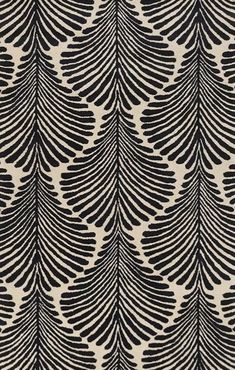 a black and white pattern with orange trims on a beige background, in the shape of leaves