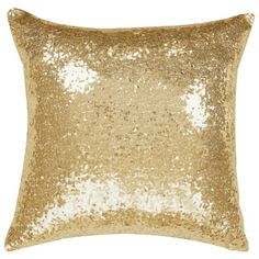 a gold sequin pillow on a white background