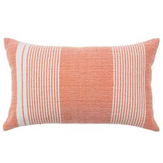 an orange and white striped pillow on a white background