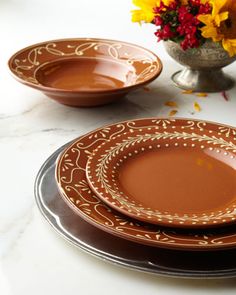 a table topped with plates covered in chocolate