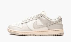 The Women’s Nike Dunk Low “Light Bone” is an inherently vintage, two-tone, white-and-grey colorway of the women’s sizing of the retro basketball shoe by Nike. Inadvertently, the “Light Bone” mimics the look of many Dunk colorways found in Off-White and Nike’s “Lot 50” collection from August 2021. Like “Lot 50,” the “Light Bone” features a simple, easy-to-wear color palette and subtle vintage-inspired details. Here, Sail leather appears on the perforated toe, mid-panel, collar, and heel. The over Nike Dunk Low Light Bone, Dunk Low Light Bone, Womens Dunk Low, Nike X Travis Scott, Retro Basketball Shoes, Bone Shoes, Adidas Spezial, Cute Nike, Cute Nike Shoes