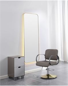 a chair and mirror in a room