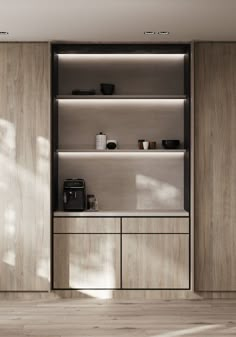 an empty kitchen with wooden cabinets and shelves