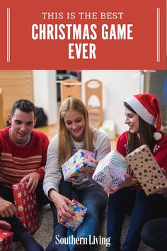 three people sitting on the floor with presents in their hands and text overlay reads, this is the best christmas game ever southern living