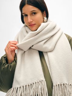 Our newest scarf is the perfect addition to your cold-weather wardrobe. Crafted from a cozy merino wool-cashmere blend, it boasts hand-twisted tassels at each end. The generous width allows you to wrap, knot and layer the accessory with ease. Details "70 1/2 X 27". 70% Wool, 30% Cashmere. Dry clean only. Style #21050 Cashmere Travel Wrap, Tassel Scarf, Scarf Hat, Cardigan Top, Wrap Sweater, Sweater Sale, Knitwear Cardigan, Fall Shopping, White Shop