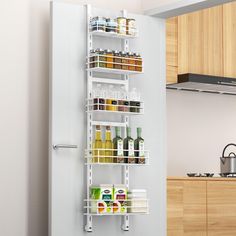 a white refrigerator freezer sitting inside of a kitchen