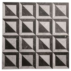 a black and white marble tile design