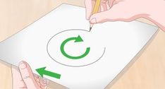 someone is drawing the letter c on paper