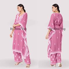 Nibs Tog Ryon Cotton Lucknowi Chikankari Kaftan Dress for Women Pink Beautifully crafted with different motifs of Chikankari, well finished with lace work, Presenting you this beautiful Chikankari Kaftan Dress Set with Bottom. Made of Soft ryon Cotton fabric. Check full details below. Shop More Chikankari outfits by Nibs Tog on our Shop : https://www.etsy.com/in-en/shop/NibsTog Fabric: The Kaftan is made of soft Ryon Cotton and it is not transparent fabric. Style: The outfit is style in Kaftan Look with a waist string to adjust. The Set includes one Kaftan and Straight Palazzo Pant with Chikankari Embroidery. Occasion: The Chikankari Kaftan Dress can be styles for any casual day, at home for your comfort or you can carry the Kaftan for Beach Cover Up, It can be Kaftan for Resort Wear and a Pink Anarkali Kaftan For Navratri, Pink Bollywood Kaftan With Dabka, Traditional Pink Georgette Kaftan, Traditional Pink Kaftan With Traditional Drape, Bohemian Pink Embroidered Palazzo Set, Bohemian Embroidered Pink Palazzo Set, Traditional Tunic Palazzo Set For Navratri, Pink Anarkali Kaftan For Festivals, Chikankari Embroidery Saree Kaftan For Diwali