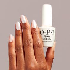 A white with pink and green pearlescense that'll unleash your magic! Follow the yellow brick road to a Wicked-ly beautiful holiday collection. Enchant nails with limited edition shades and in mani effects, including glow-in-the-dark. Elevate your style with OPI. This stunning, deep hue is formulated to endure for a minimum of two weeks post-application. With vibrant polishes and transformative treatments, it’s easy to see why OPI is the most sought-after brand in the industry. No matter which op New Nail Ideas, Opi Gel Nails, Nail Beds, Skin Care Salon, Red Carpet Manicure, Gel Lamp, Glitter Gel Polish, Gel Art, Beyond Beauty