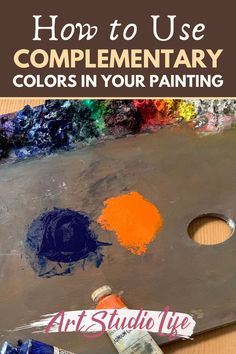 an easel with paint on it and the words how to use complementary colors in your painting