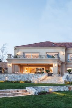 a large house with steps leading up to it