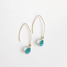 Where the timeless elegance meets modern vibes, that's where you'll find these drop earrings. GEMSTONE: Glass CLOSURE: Gold plated kidney ear wires LENGTH: 2.25" long Glass Drop Earrings, Earrings Gemstone, Earrings In Gold, Modern Vibe, Gems Jewelry, Gold Earrings Dangle, Ear Wires, Aquamarine, Beautiful Jewelry