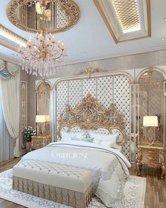 a fancy bedroom with gold furniture and chandelier above the bed, along with an ottoman