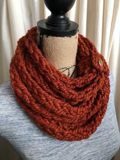 This beautiful burnt orange scarf is so warm and cozy, you won't want to take it off. The rich color of this scarf will be the perfect accent for any outfit. You don't have to worry about feeling itchy because the yarn is very soft and can be worn with a collarless top without feeling scratchy! Perfect for a dressy or casual look.  Since this scarf is one long strand that's wrapped around several times, I've secured it with a removable cuff to ensure you don't have to fuss with the many layers that create this beautiful look. However, because the cuff is removable, you'll be able to change the way it's layered, if you like.  Your choice of cuff material. ✦ Perfect gift for you or someone else. Mother's Day, thank you gift, graduation, birthday, etc. ✦ 80% acrylic, 20% wool ✦ Since I make t Orange Fall Scarves, Warm Brown Scarf For Fall, Cozy Warm Infinity Scarf For Fall, Warm Brown Fall Scarf, Hand Knitted Scarves For Fall, Hand Knitted Loop Scarves For Fall, Hand Knitted Loop Scarf For Fall, Red Knitted Fall Scarves, Red Knitted Scarf For Fall