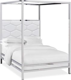 a white bed with an upholstered headboard and foot board on the side