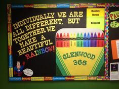 a bulletin board with crayons on it and the words, individually we are all different but together we make a beautiful rainbow