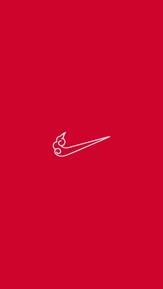 a pair of scissors on a red background