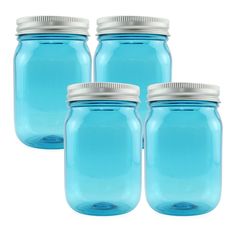 four blue mason jars with silver lids