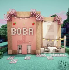 an image of a pink building with flowers on the front and side walls that say area