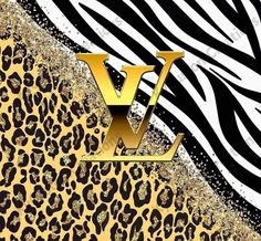 an animal print wallpaper with the letter v in gold and black letters on it