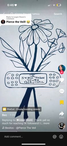 an image of a flower drawn on the back of a cell phone with text below it