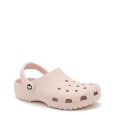 Fall in love with the step-in comfort of these unisex quartz (light pink) Classic clogs from Crocs. Made of lightweight, durable Croslite material in a molded design for long-term use, these easy-to-clean clogs have a pivoting heel strap for a perfect fit. Iconic Crocs Comfort system provides lightweight feel, flexibility, and 360-degree comfort. The ventilation holes on the upper allow to attach Jibbitz charms to personalize your look. (charms sold separately) | Crocs Women's Unisex Classic Clo Crocs Light Pink, Light Pink Crocs, Cool Crocs, White Clogs, Crocs Pink, Pink Crocs, Crocs Jibbitz, Women's Crocs, Birthday List