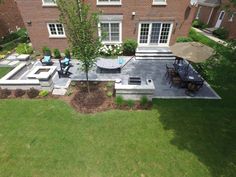 an aerial view of a patio and dining area in a home's back yard