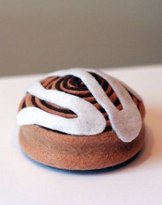 a brown and white object sitting on top of a table