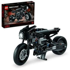 a lego motorcycle is shown in front of a box