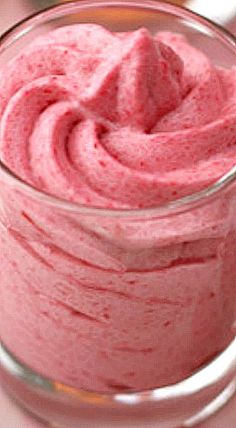 a close up of a bowl of food with pink stuff in the middle and another bowl next to it