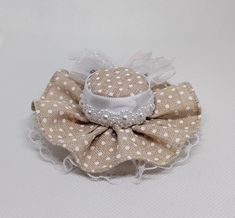 Khaki mini hat for babies, girls, adults and pets. Hat size is approximately 3.5 inches wide by 1.5 inches tall. Mini hat can be attached to a metal alligator clip, a circular velcro, a white soft elastic headband or white ribbon for pets. Please choose the finish: -2.2 inches metal alligator clip -3cm circular velcro -5/8 by 16 or 18 inches soft elastic headband -3/8 by 18 or 25 inches ribbon (for pets) -There may be slight variation in size -Due to lighting color may vary slightly -Mini hats are made in a smoke free environment -Every hat is handcrafted by me. *Please feel free to contact the seller if you have a question **Mini hats are ready to ship the next business day All mini hats will be shipped in a box. Adjustable Brimmed Sun Hat For Gift, Adjustable Brimmed Sun Hat As A Gift, Cream Brimmed Mini Hat With Adjustable Fit, Beige Mini Hat With Short Brim, Adjustable Sun Hat With Short Brim, Adjustable Short Brim Sun Hat As Gift, Adjustable Brimmed Mini Hat As Gift, Cute Handmade Mini Hats For Gifts, Whimsical White Mini Cap Hat