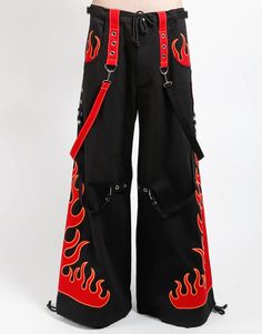 Dark Street pant in black with removable straps, adjustable ankles, D-rings, and deep pockets with embroidered flames on sides. WOMAN IS WEARING X-SMALLMAN IS WEARING MEDIUMSIZING BASED ON MENS FIT– Refer to Unisex Darkstreet Pant - Size Chart (Based on Men's Sizing)– Drawstring and adjustable waist buckles allow for a tighter fit on the waist– 100% Cotton.– Hand wash cold. Lay flat to dry. Heat Map Pants, Red Cybercore Outfit, Art Sona, Black And Red Pants, Embroidered Flames, Red Mesh Top, Cyberpunk Pants, Fire Pants, Fire Outfits