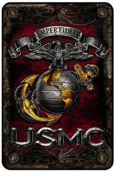 a metal sign with the words usmc and an eagle, globe on top of it