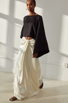 Floor-length skirt with front tucked draped detail in silk crepe-back satin. Details include a center front godet and zipper for closure. Lined in lightweight silk. Wear it with Paloma Top or Eloisa Top. Draped Top Outfit, Silk Top Outfit, White Satin Skirt, Satin Outfits, Silk Summer Dress, Modern Kimono, Fashion Fail, Couture Tops, Clothing Essentials