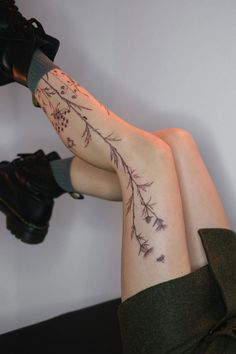 Discover the beauty of nature with this exquisite botanical leg tattoo featuring delicate floral designs and intricate details. Perfect for tattoo enthusiasts looking for nature-inspired ink. 🌿✨ Leg Full Tattoo, Back Of Legs Tattoo, Flower Tattoos Leg, Flowers Leg Tattoo, Cute Leg Tattoos, Cool Leg Tattoos, Flower Tattoo Leg, Back Leg Tattoo, Flower Leg Tattoo