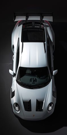 an overhead view of a white sports car