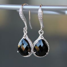 "These beauties are standouts! Perfect for that special occasion! Elegant  jeweled, french earrings carry stunning black onyx teardrop crystals with a gold or silver rope trim. The crystal detail on these earrings give them such a classy and sophisticated feel. The ruby red and silver earrings are shown for size reference and are available in another listing. * Sterling Silver Plated or 16k Gold Plated French Earrings * Swarovski Crystal Detailing * Faceted Crystal- 19 x 12mm(3/4x1/2\")  * Tarnish Resistant * Length- 32mm(1 1/4\") These earrings come in a jewelry bag and gift box." Black Dangle Teardrop Earrings For Party, Black Drop Earrings For Anniversary, Black Drop Teardrop Earrings For Party, Black Teardrop Drop Earrings For Party, Black Teardrop Earrings For Party, Black Drop Jewelry For Anniversary, Classic Black Earrings For Wedding, Classic Black Wedding Earrings, Black Teardrop Jewelry With Matching Earrings