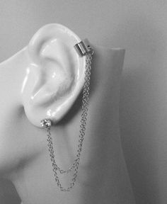 "This Pierced Helix BAJORAN STYLE Cartilage Earring is handcrafted in Sterling Silver Smooth material 5 mm (3/16 \") wide, curved 6mm (~1/4\") in diameter and polished to a perfect shine. The connected silver chains that dangle down and attach the Helix Earring to the lower ear lobe are 2 different lengths. The shorter chain is 100mm (3 1/2\") and the longer chain is 110mm (4\"). A 5mm 1/2 CT Cubic Zirconium stud earring is included. The included CZ stud is removable and may be replaced with any Ear Piercing Double, Helix Piercing Hoop, Upper Ear Piercing, Cartilage Earrings Hoop, Cartilage Earring, Helix Earrings, Fancy Jewellery, Helix Piercing, Cz Stud Earrings